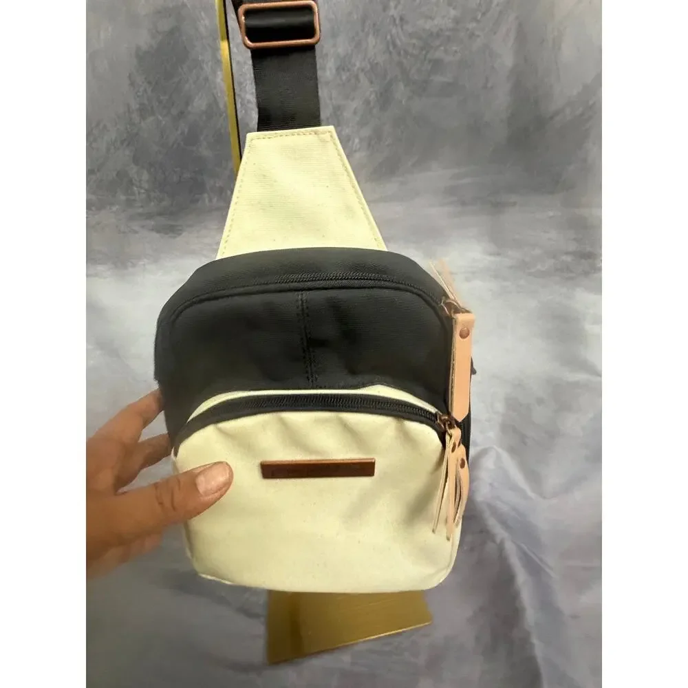 Petunia PIckle Bottom Criss Cross Sling Bag - Excellent Condition